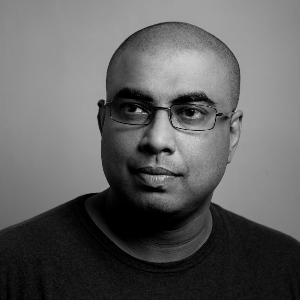 Dinil Abeygunawardane; author of Struck by Light - Photographer, Writer, Content Creator and Educator - Portrait by G.Hettiarachchi